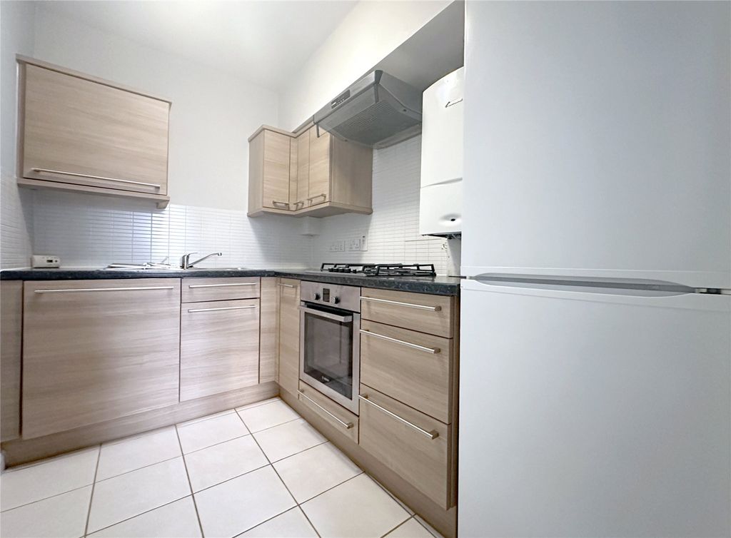 Property photo 3 of 8 Kitchen