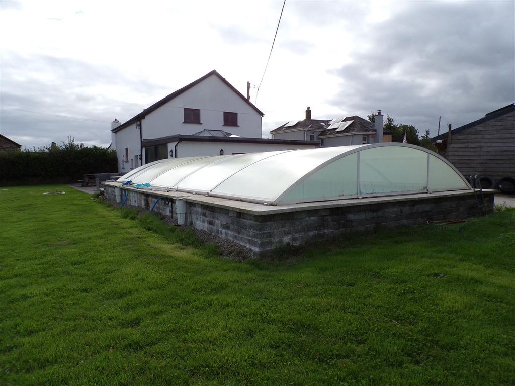 Property photo 2 of 11 Covered Pool.Jpg