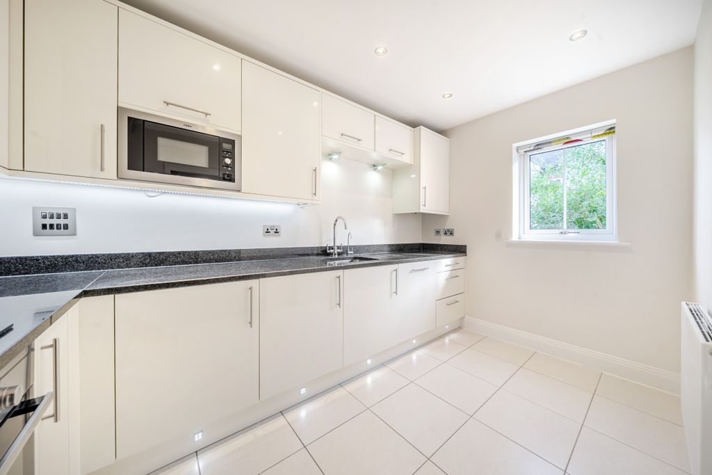 Property photo 3 of 12 Kitchen