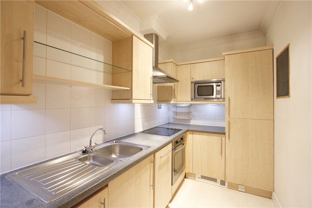 Property photo 3 of 8 Kitchen