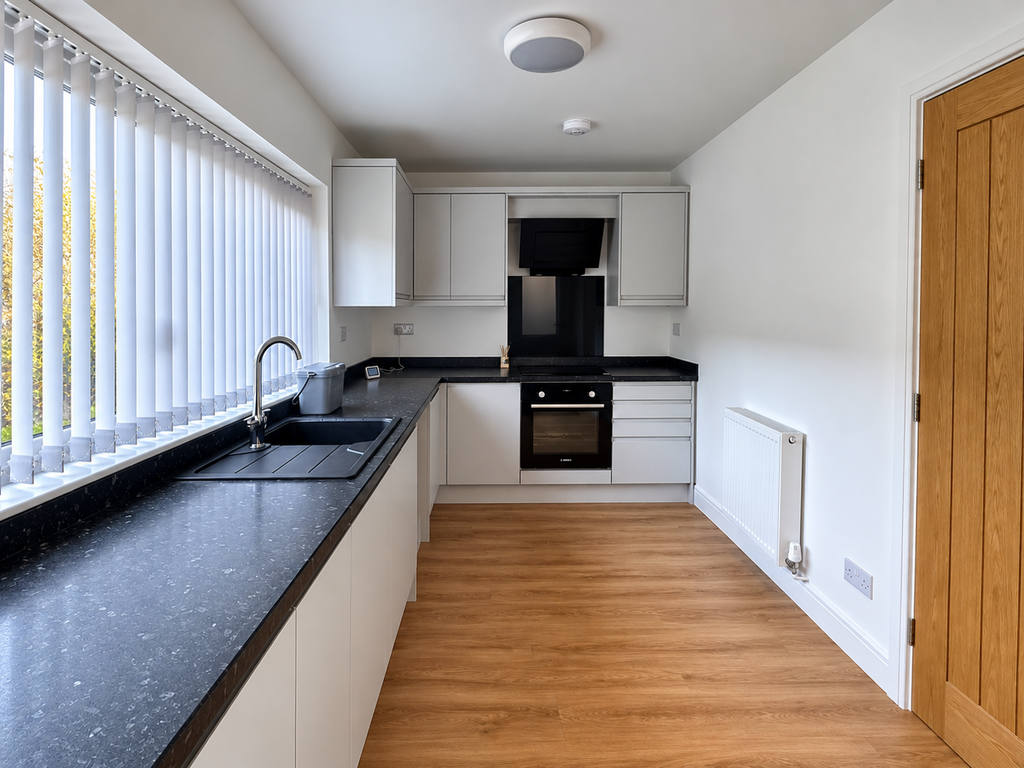 Property photo 3 of 7 Kitchen