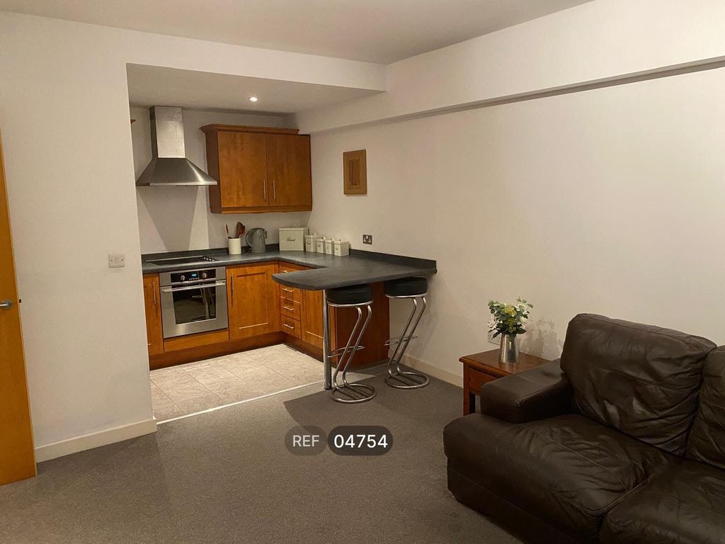 Property photo 3 of 8 Kitchen / Living Area