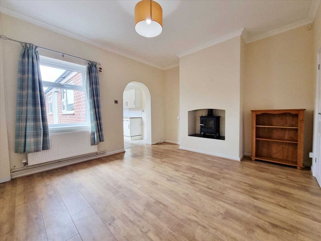Property photo 3 of 10 Living Room: