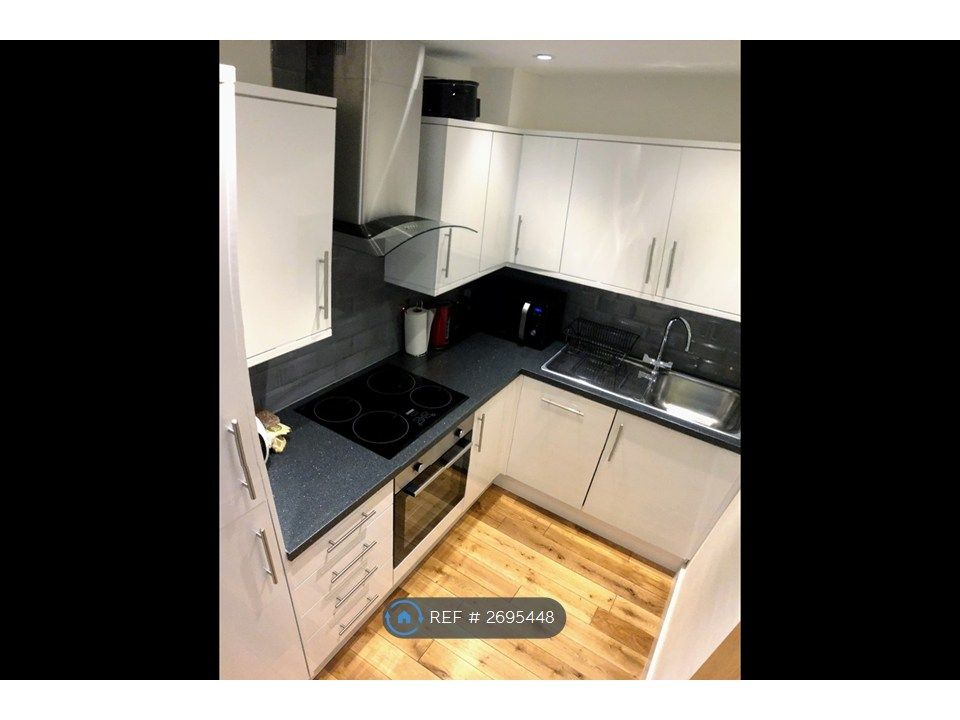 Property photo 3 of 12 Kitchen