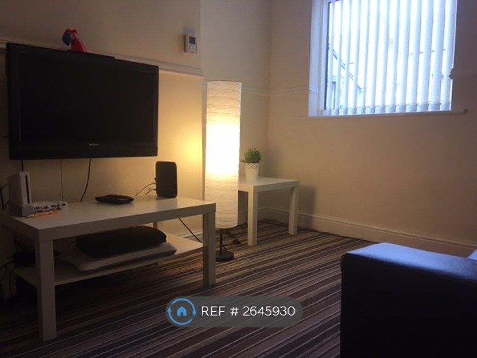 Property photo 1 of 24 Living Area