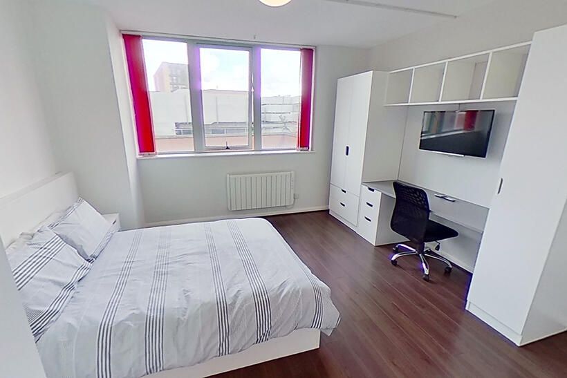 Property photo 1 of 6 Bright And Modern Master Bedroom Featuring A Large...