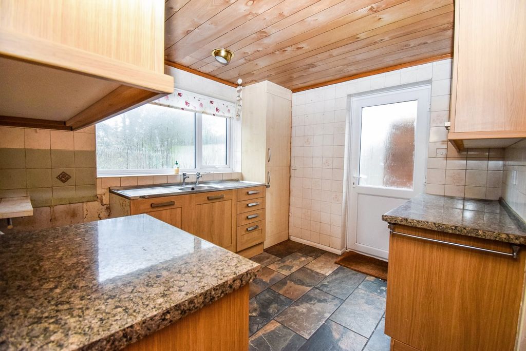 Property photo 3 of 13 Kitchen