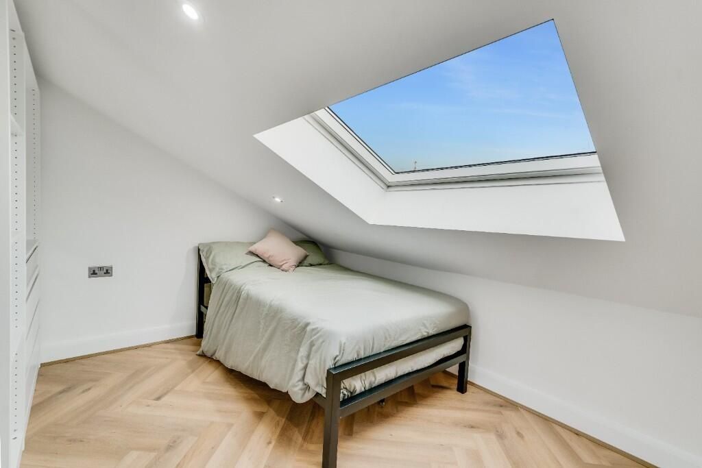 Property photo 2 of 9 Bright And Airy Master Bedroom Featuring A Comfort...