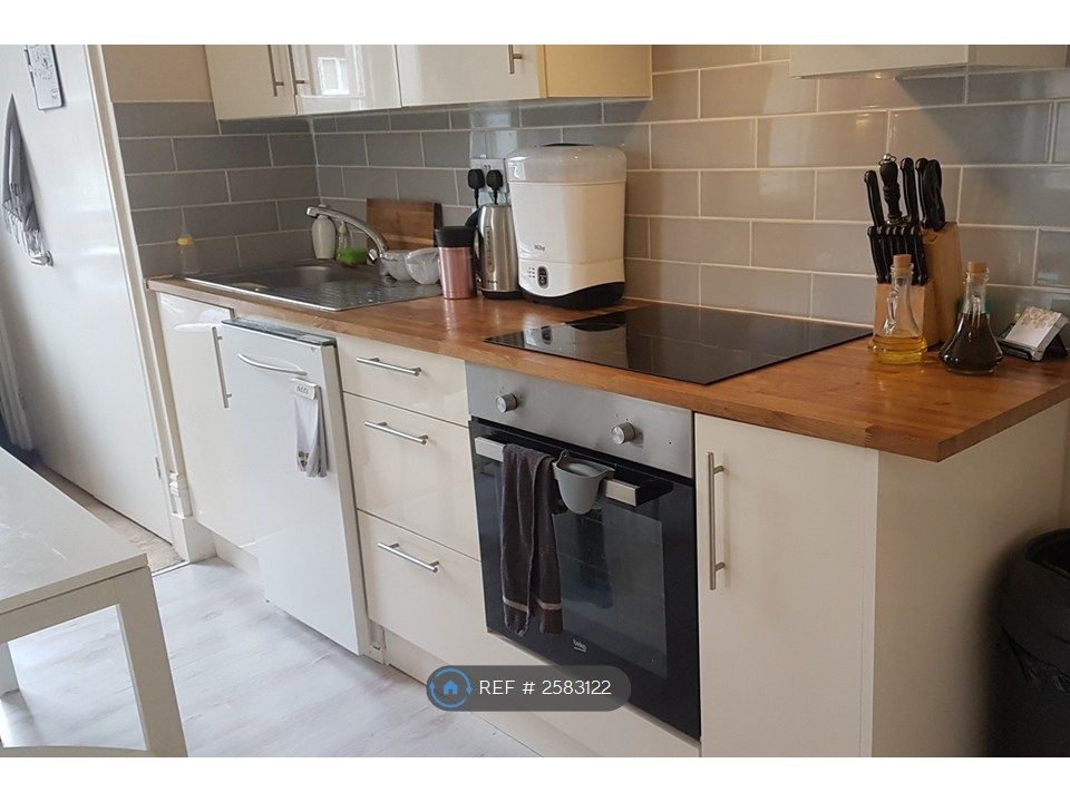 Property photo 3 of 6 Modern Kitchen With Oven