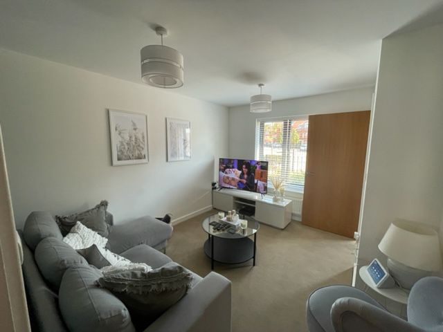 Property photo 2 of 12 Living Room