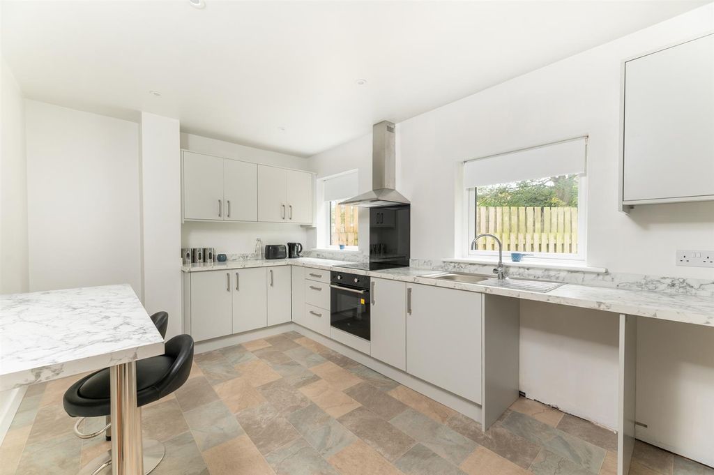 Property photo 3 of 25 Kitchen