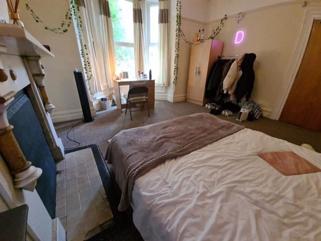 Property photo 2 of 43 A Spacious And Well-Lit Master Bedroom Featuring A...