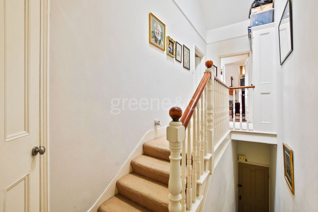 Property photo 3 of 8 Stairway Hallway