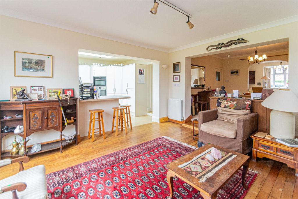 Property photo 3 of 21 Family Room & Dining Kitchen