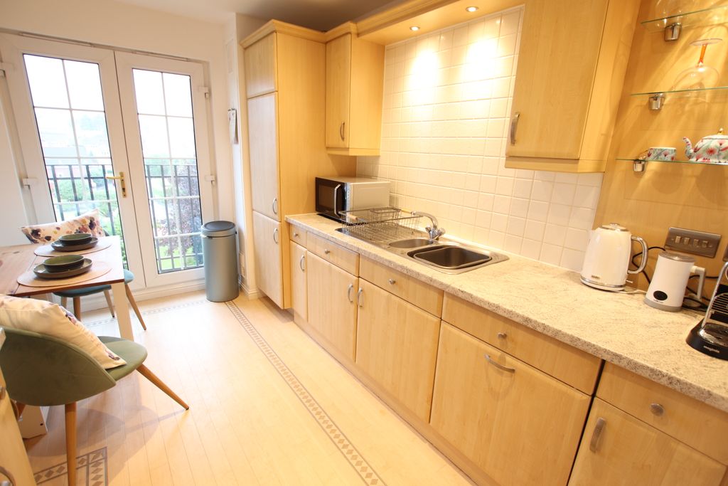 Property photo 3 of 9 Kitchen