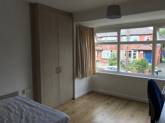 Property photo 2 of 6 A Bright And Tidy Bedroom Featuring A Large Window...