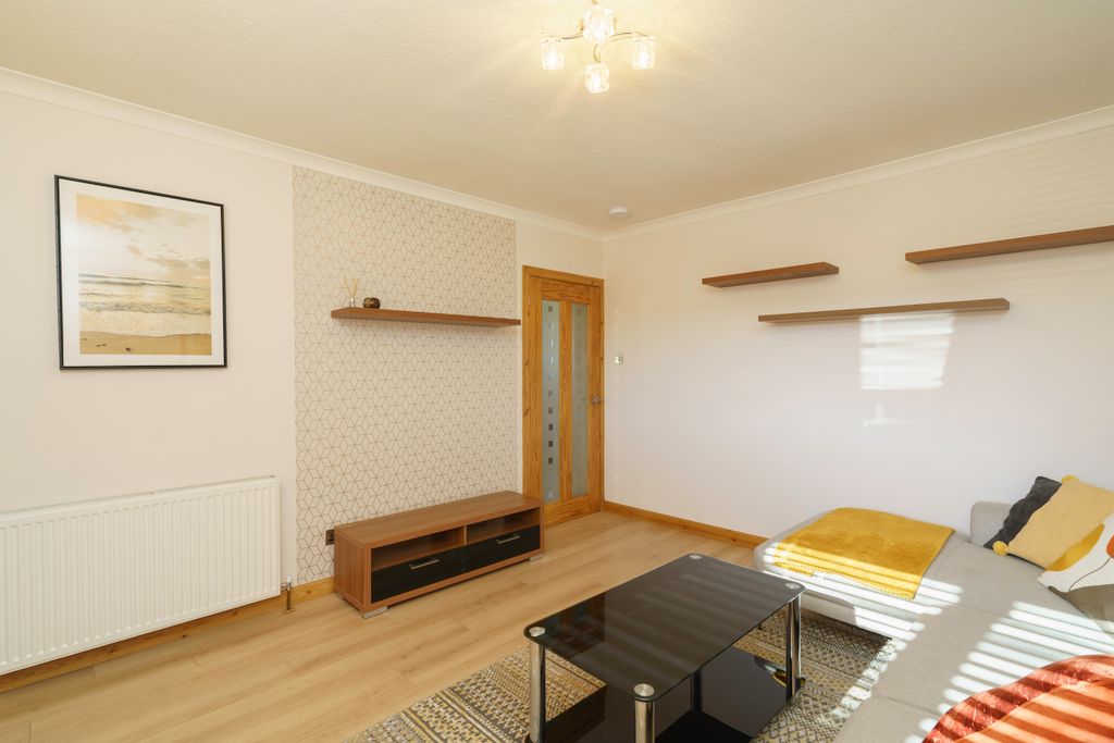 Property photo 3 of 18 15. Living Room Angle 3