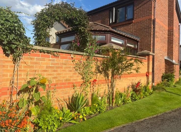 Property photo 3 of 24 Outside Flowers.Jpeg