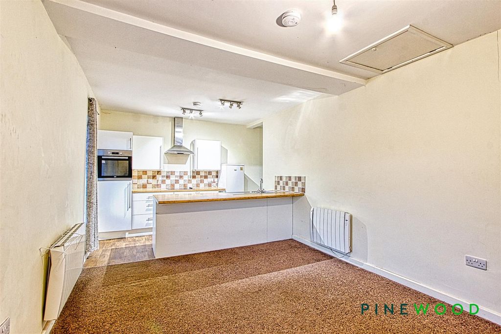 Property photo 2 of 13 Kitchen Living