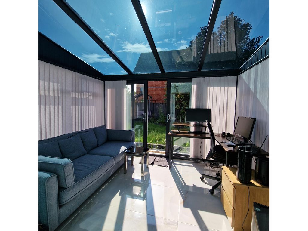 Property photo 2 of 13 Conservatory