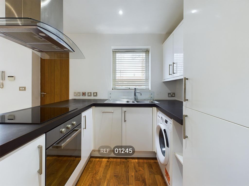 Property photo 2 of 17 Kitchen &amp; Living Area