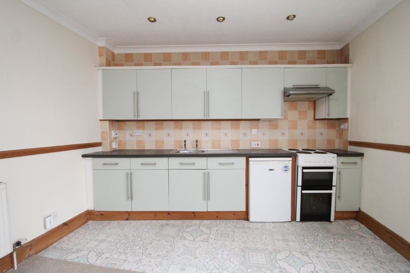 Property photo 3 of 6 Kitchen Area