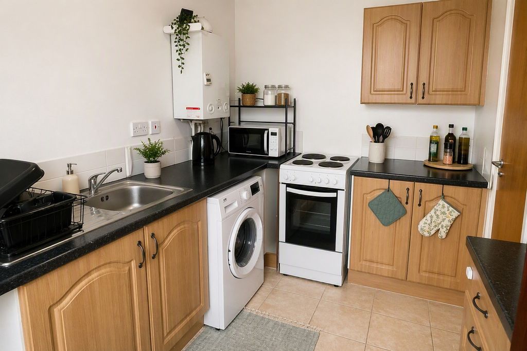 Property photo 2 of 9 Kitchen