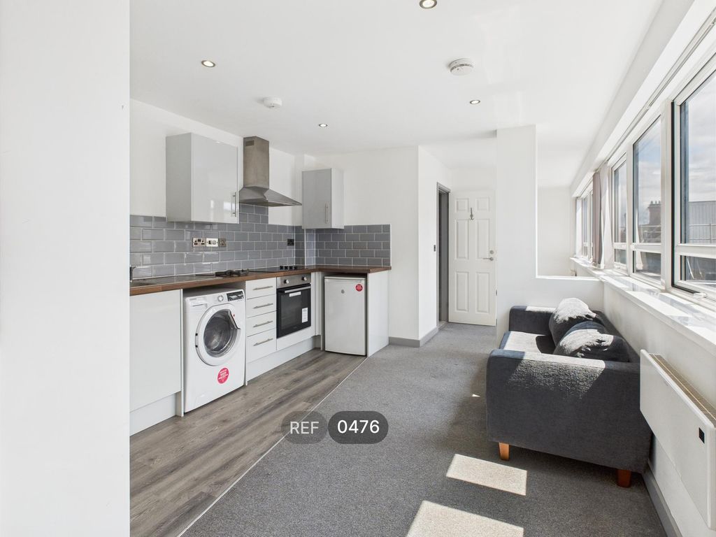 Property photo 3 of 12 Kitchen & Living Area