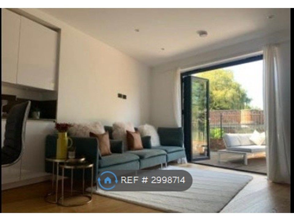 Property photo 3 of 5 Living Room (Showing Patio Sliding Doors)