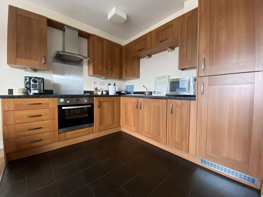 Property photo 3 of 12 Kitchen