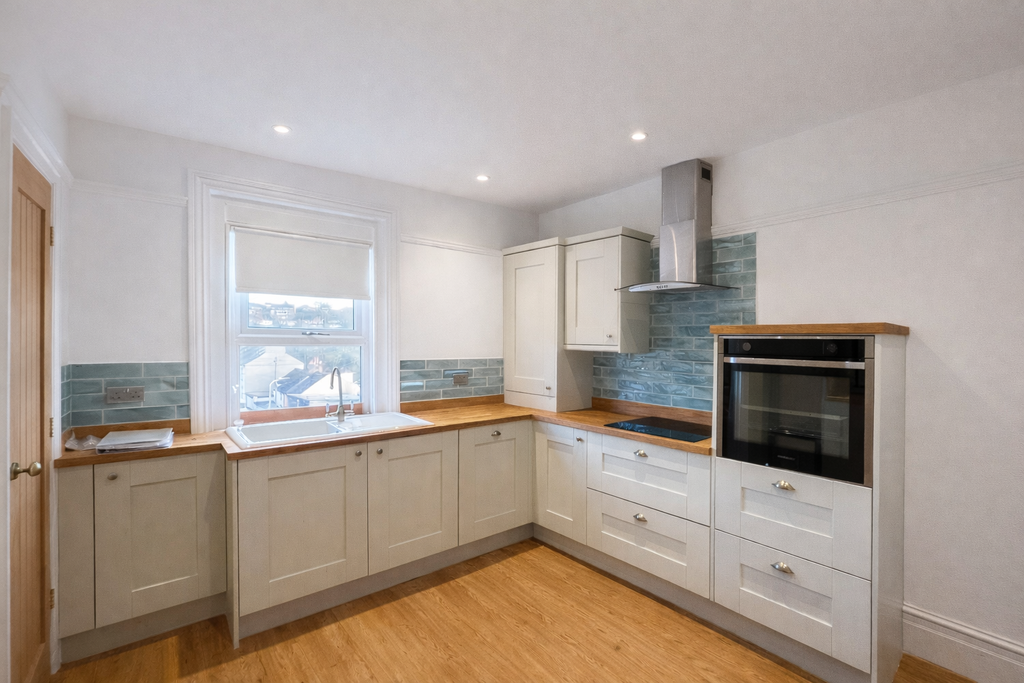 Property photo 2 of 12 Kitchen