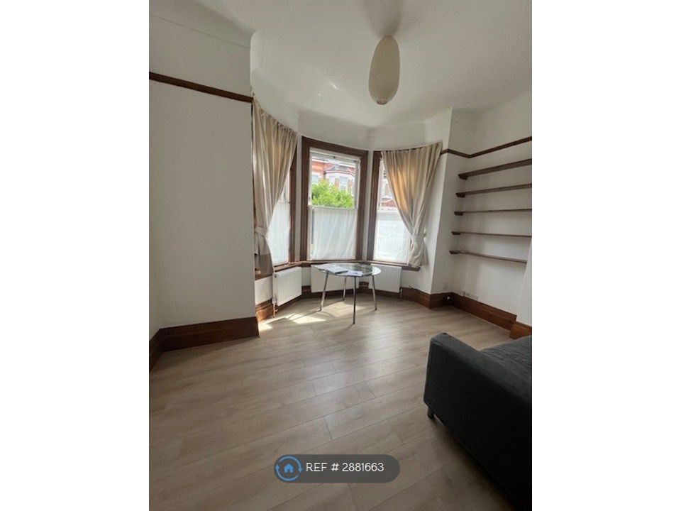 Property photo 2 of 8 Sitting Room Angle 1