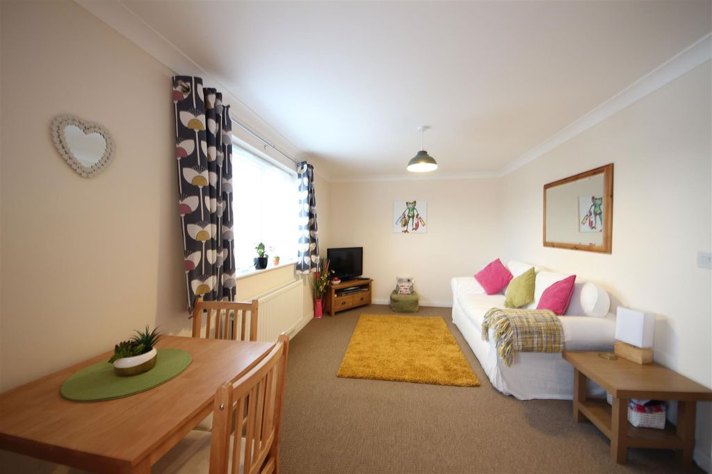 Property photo 2 of 10 Living Area