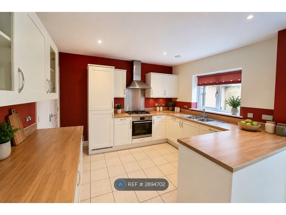 Property photo 3 of 12 Kitchen