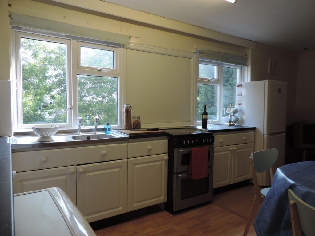 Property photo 2 of 5 Bright Kitchen With Dual Windows And Ample Storage...