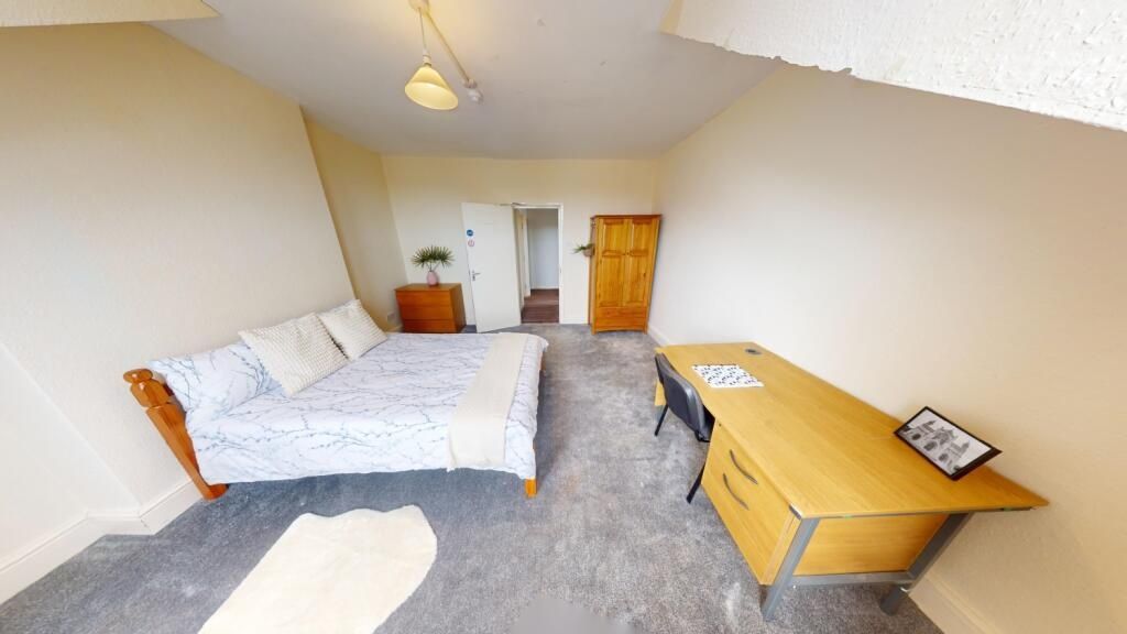 Property photo 1 of 15 Spacious And Tidy Master Bedroom Featuring A Large...