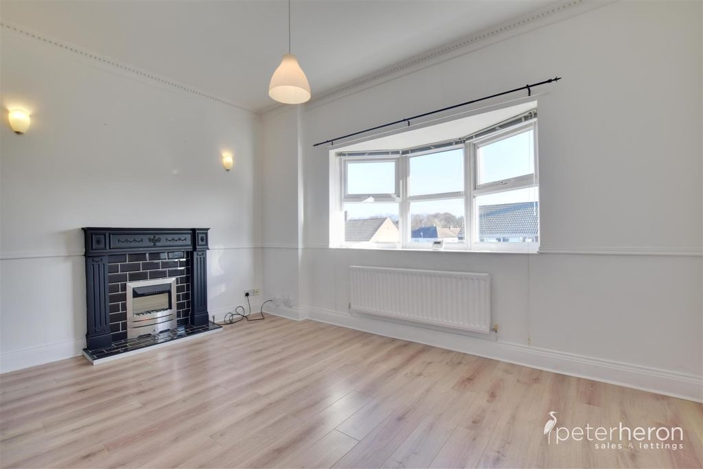 Property photo 2 of 12 Living Room