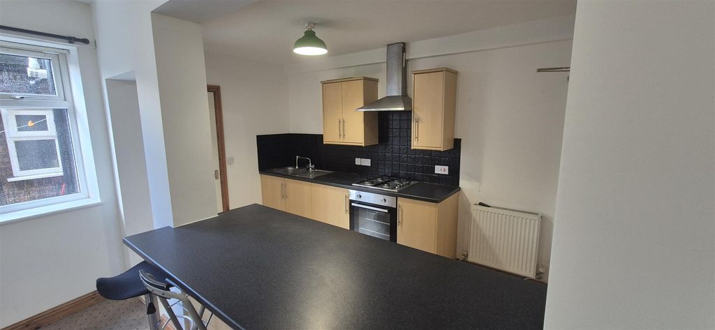 Property photo 3 of 13 Kitchen