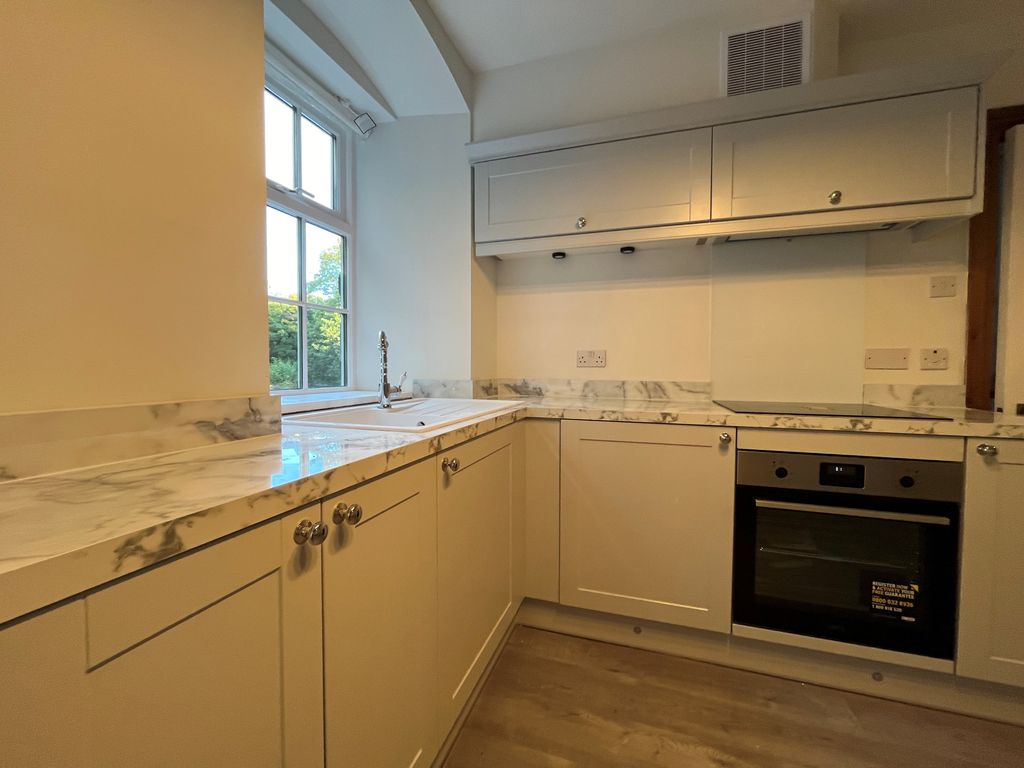 Property photo 3 of 9 Kitchen