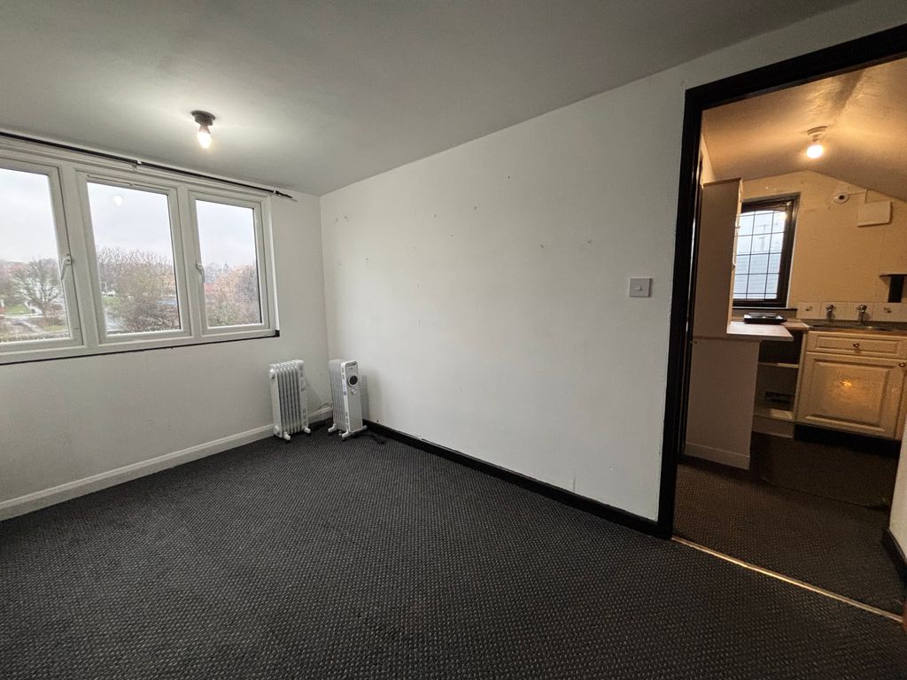 Property photo 1 of 10 Living Area