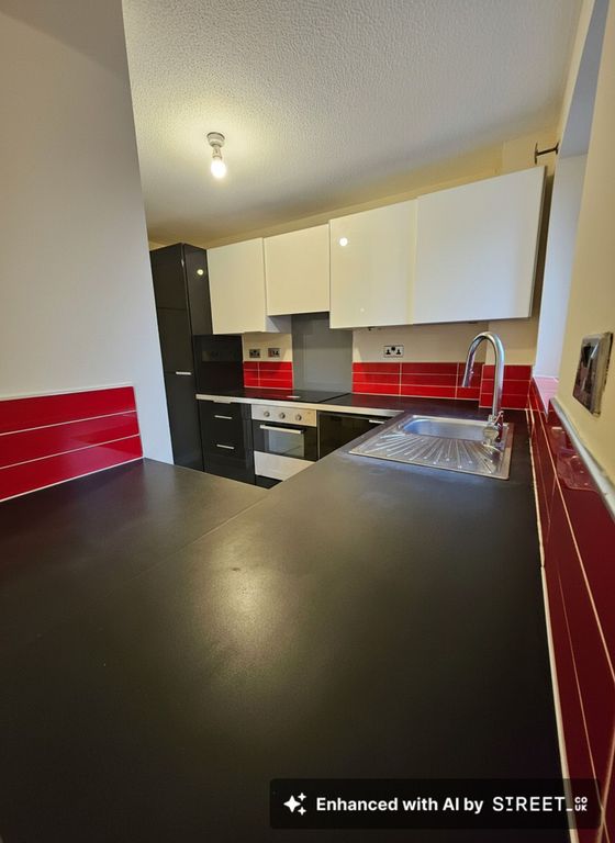 Property photo 1 of 9 Kitchen