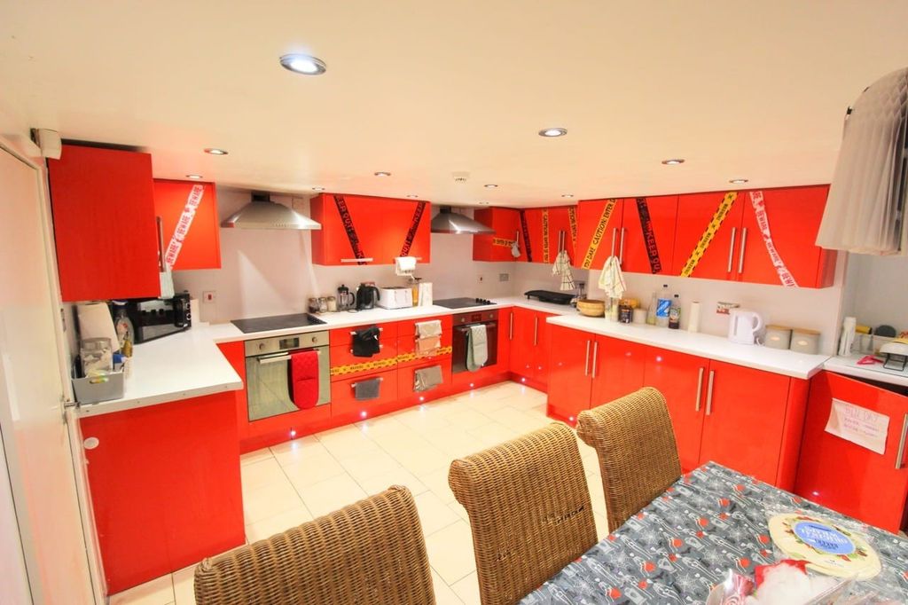 Property photo 2 of 5 Bright Modern Kitchen With Bold Red Units, Integra...