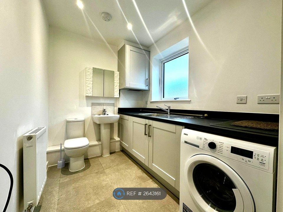 Property photo 3 of 12 Utility Room