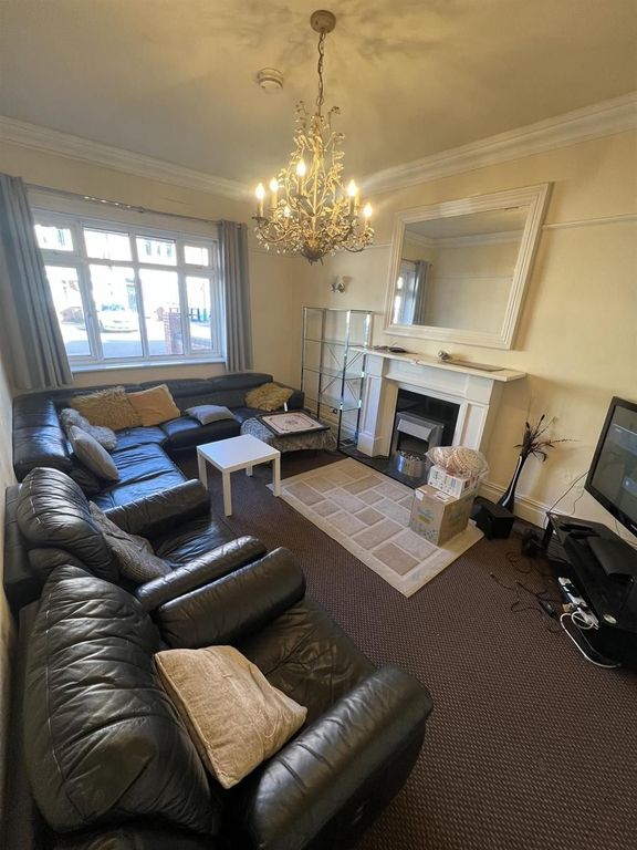 Property photo 1 of 15 Elegant Living Room With A Grand Chandelier...