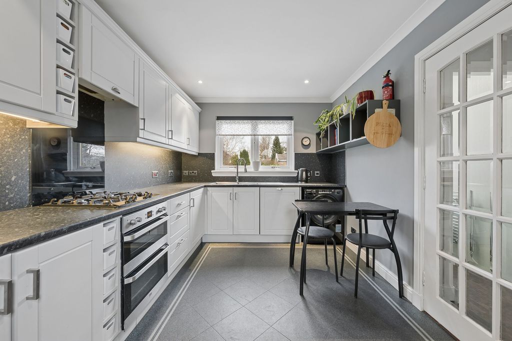 Property photo 3 of 32 Kitchen Area