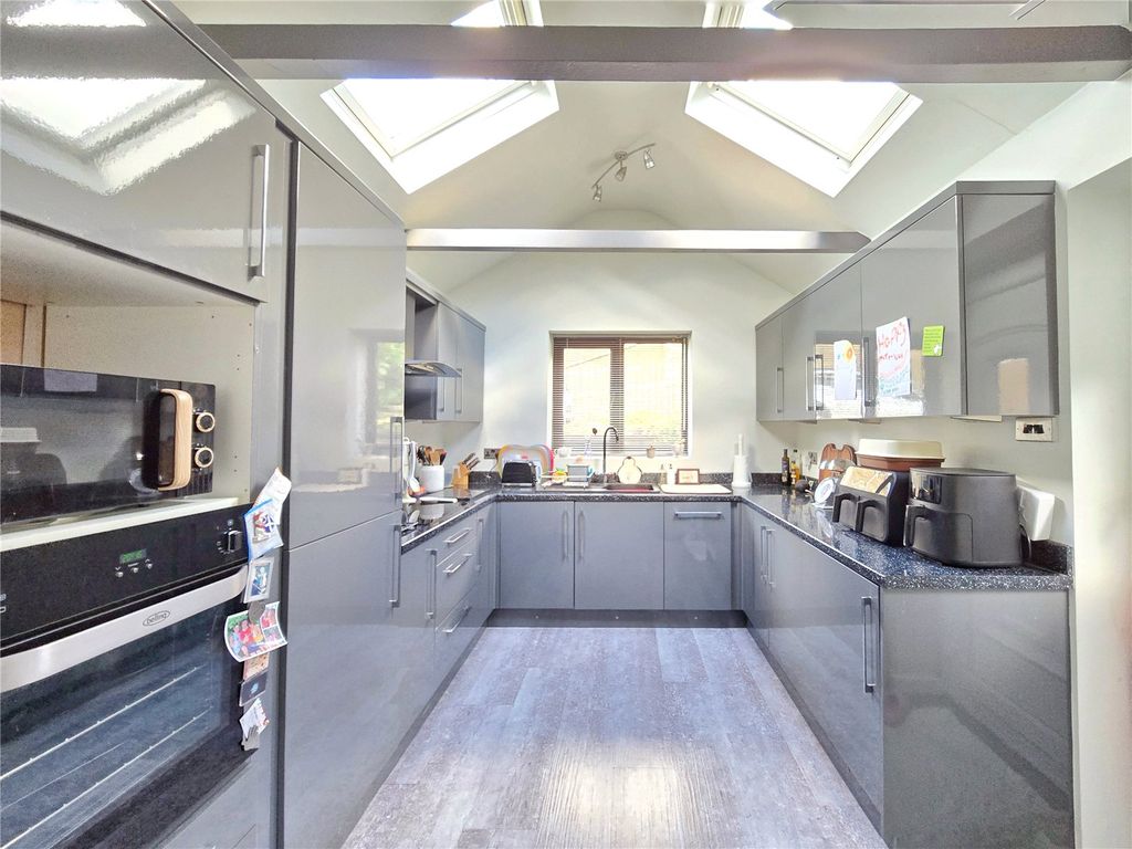 Property photo 3 of 12 Modern Kitchen