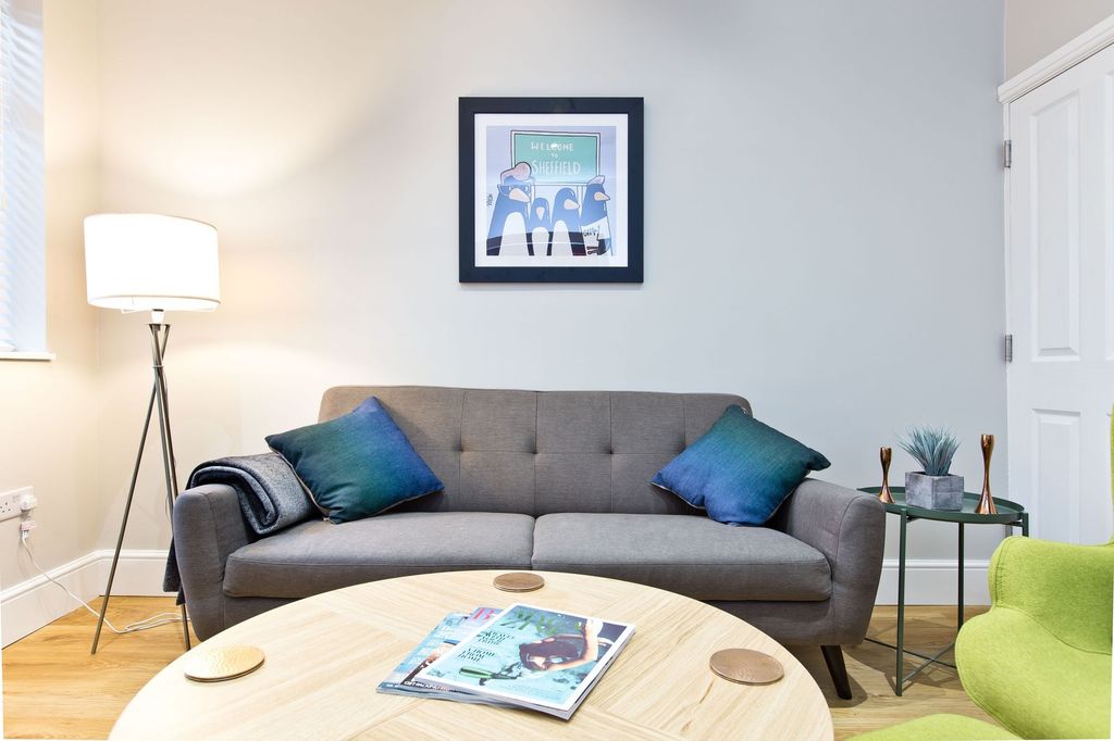 Property photo 2 of 27 Bright, Contemporary Living Area With A Grey Two-S...