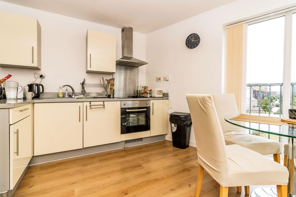 Property photo 3 of 9 Kitchen Area