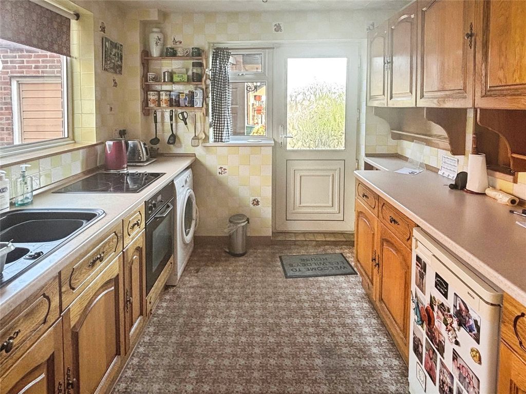 Property photo 2 of 18 Kitchen Area