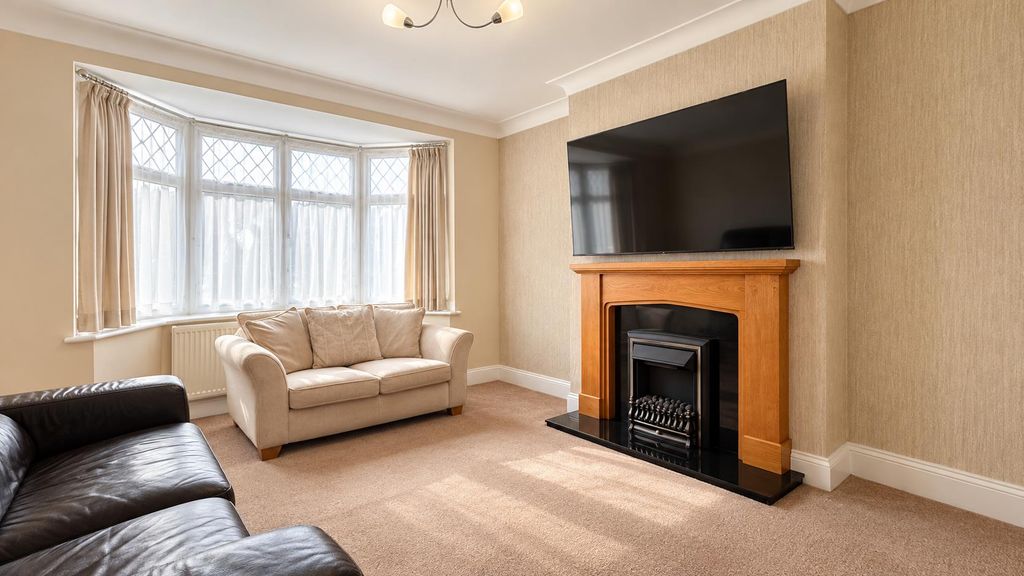 Property photo 2 of 15 Sunlit Bay Window Living Room.Png